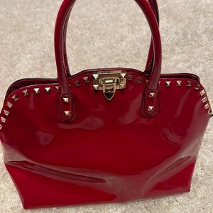 VALENTINO
Red Patent Leather Rockstud Handle Bag